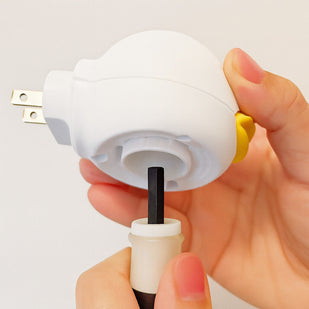 Place the vial into the diffuser and twist it securely into position.