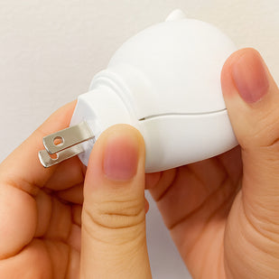 The plug rotates 90° to fit various outlet orientations.